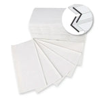 Stack of hygoclean 2-ply white paper napkins made from fsc recycled paper with zigzag v/zz folding 23x21 cm