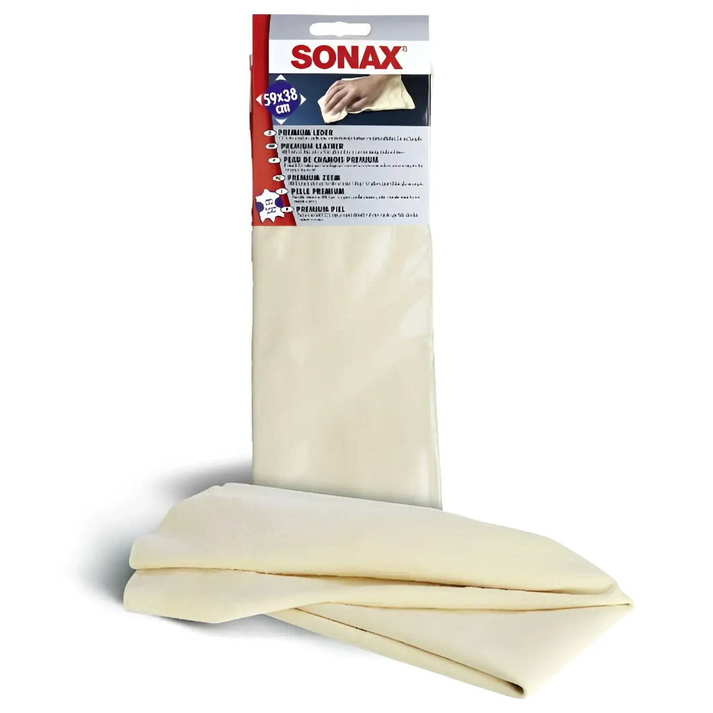 Creamfarbener sonax premiumleder reinigungstuch in rotem und weißem karton für streifenfreie reinigung