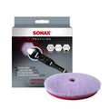 Sonax profiline hybridwollpad 165 da lila hybridwoll-polierpad mit rotem boden und sonax profiline verpackung